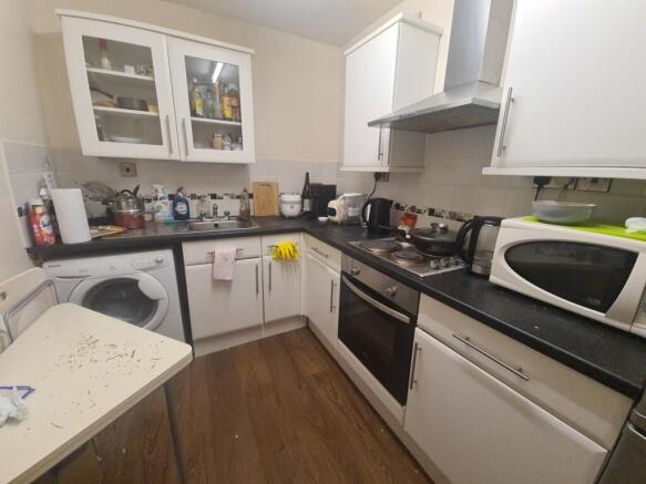 A well-maintained kitchen with modern appliance...
