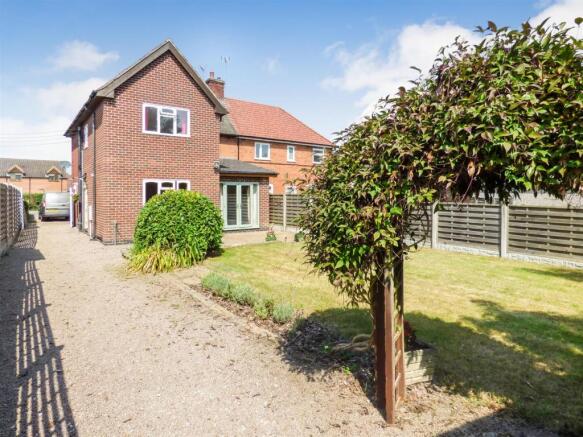 Rear of Property with Drive.jpg