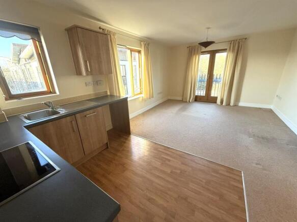Living Room With Fitted Kitchen Area