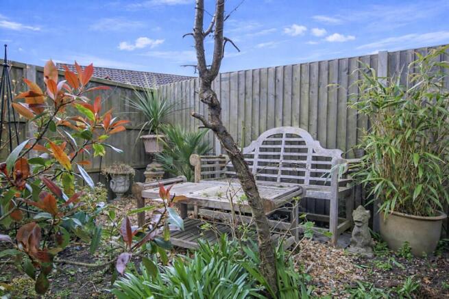 A rustic garden corner in daylight.jpg