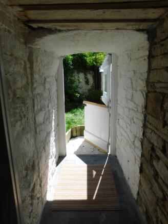Archway To Garden