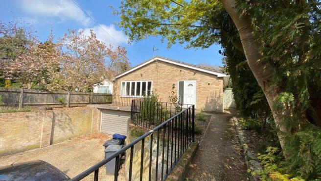 Detached bungalow with driveway and garden acce...