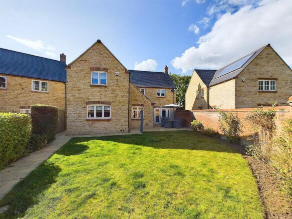 Rear garden with view towards house.