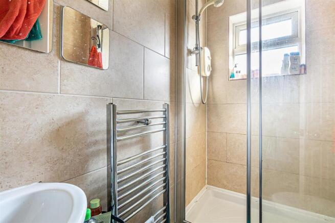 Modern shower with stylish chrome radiator...