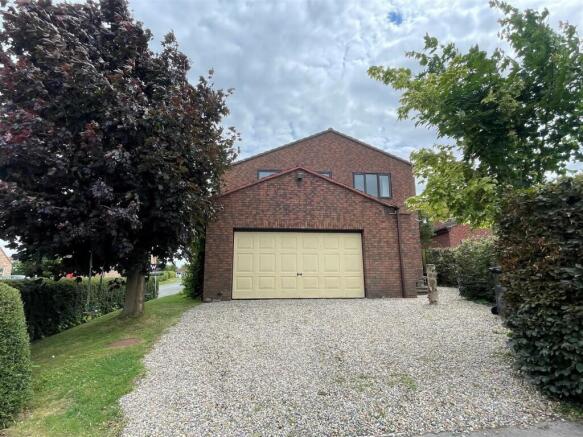 DRIVEWAY & DOUBLE GARAGE
