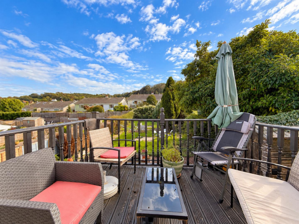 Sunny Deck Retreat with Garden Views.png