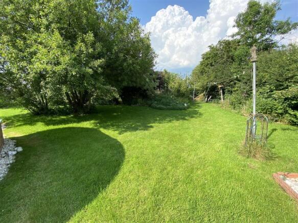 REAR PATIO AND GARDEN