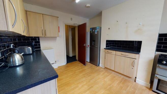 Bright and functional kitchen featuring wooden ...