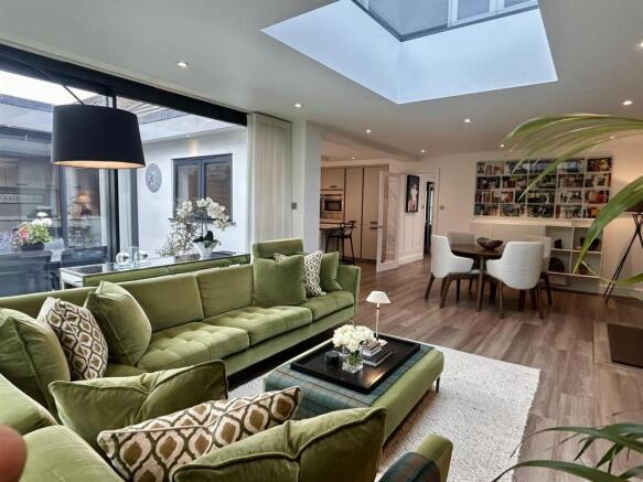 Sitting room into kitchen dining.JPEG