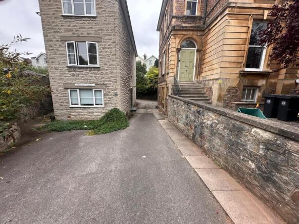 Stone-fronted period building with a raised ent...