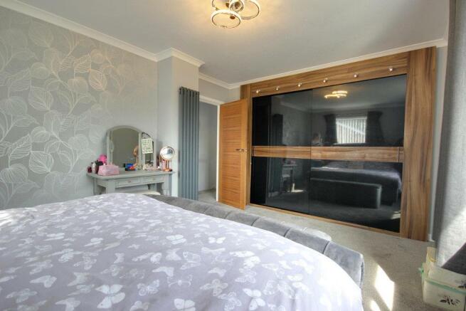 Bedroom One with sliderobes