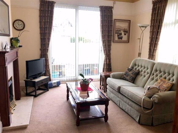 DOUBLE ASPECT SITTING ROOM