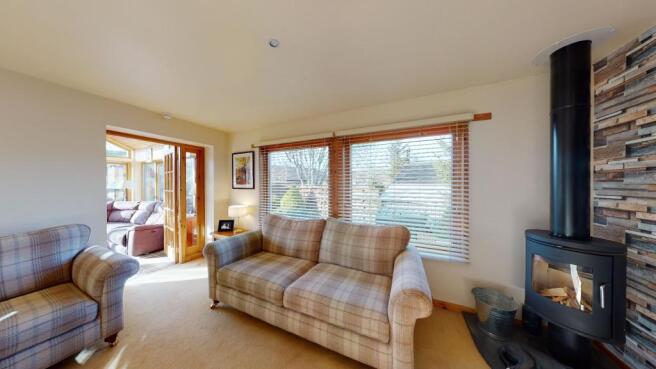 Crannog-Drumuille-Road-lounge-sun-room.jpg