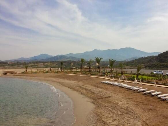 2-bedroom luxury garden apartment + communal swimming pools + within a perfect holiday complex with many amenities + Title deed in the owenrs name VAT paid Image 9999 3