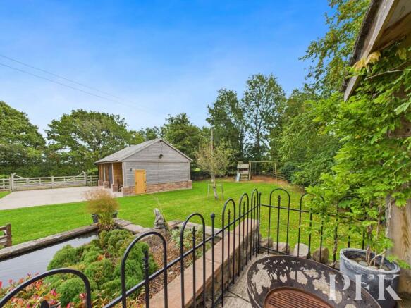 View from Gazebo to Play Area & Garage
