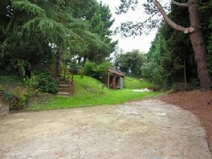 View to triple garage building