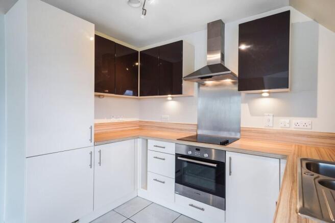 Modern kitchen with sleek gloss cabinetry...