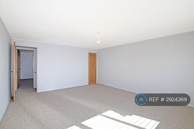 One Of Two Bedrooms With Storage Room