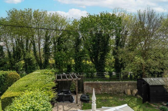 Open countryside beyond boundary