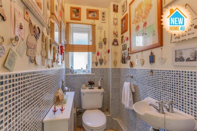 DOWNSTAIRS CLOAKROOM: