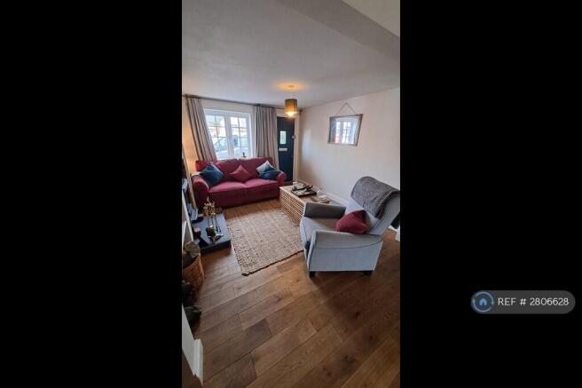 Living Room 3.29m x 3.32m With Multi Fuel Stove