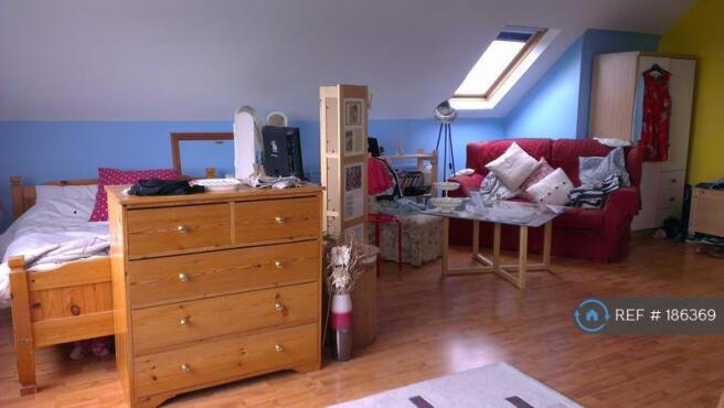 Double Bed And Living Area