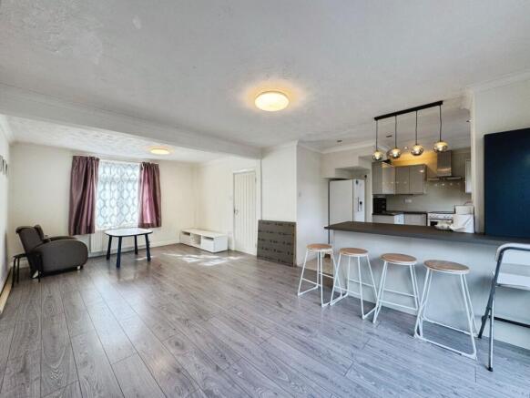 Reception/kitchen/dining area