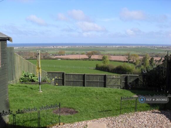 Rear Garden And Coastal Views