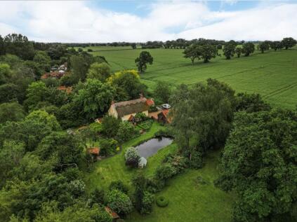 Rural Home in Scoulton Offering 0.75 Acres of Privacy and Views