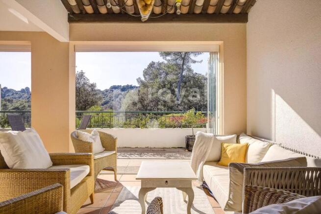 Sun-drenched terrace of the villa in a calm area o