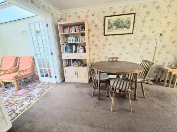 Dining through to conservatory