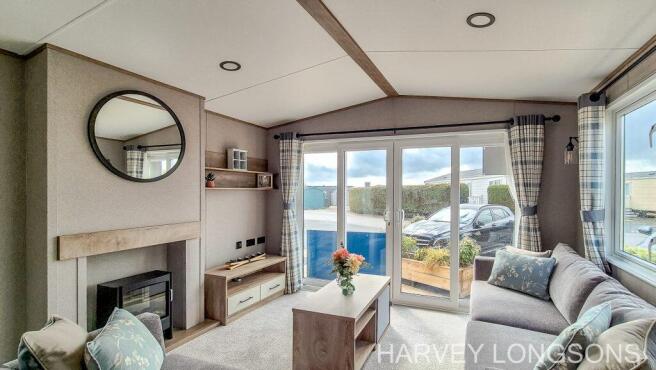 Bright lounge with fireplace in the ABI Beverley
