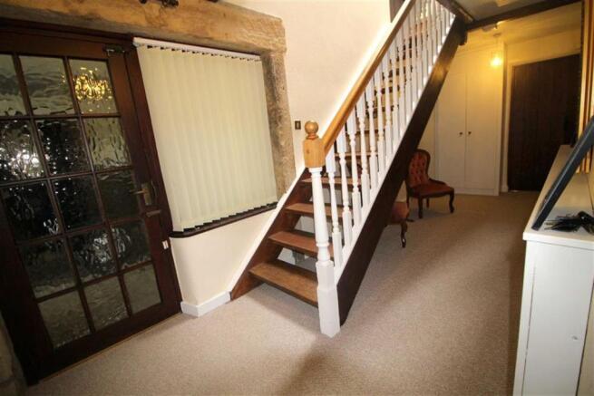 Staircase to lower level ground floor