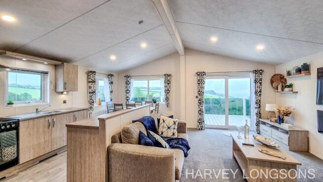 Open plan living area with countryside views in De