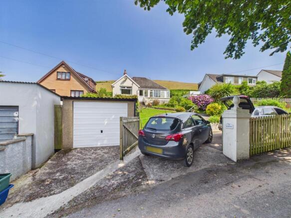 Front with garage/drive