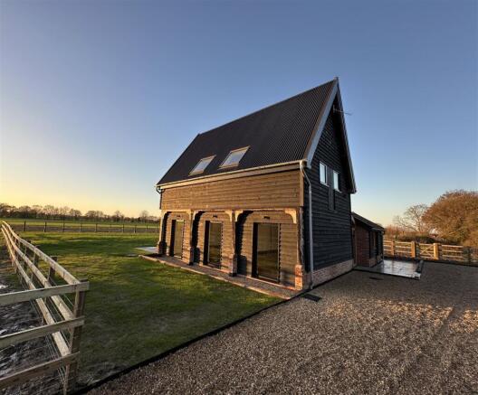 Granary exterior with fence.jpg