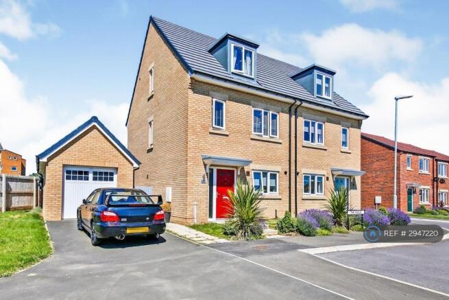 Front Of House And Garage