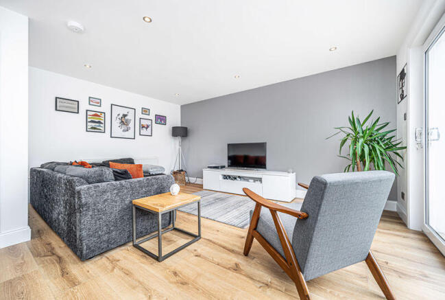 Lounge with open plan dining kitchen