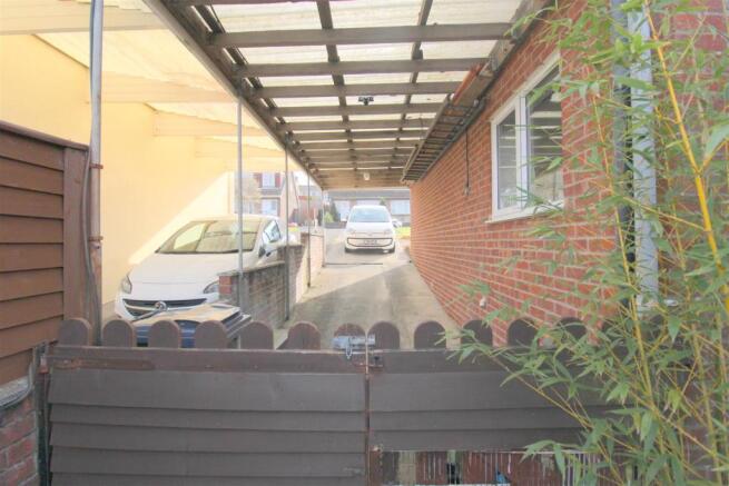 Carport to side of property