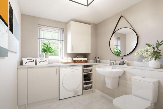 Convenient utility/cloakroom is tucked behind the stairs