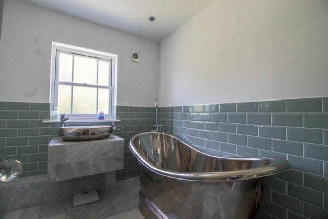 Family Bath with chrome bath