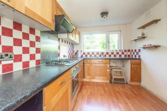 THROUGH SITTING/DINING ROOM & KITCHEN