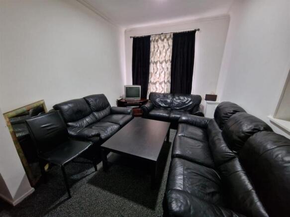 Sociable seating area with leather sofas...