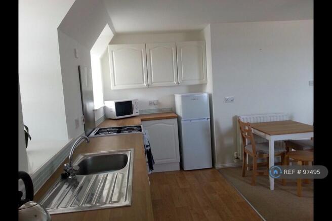 Kitchen And Dining Space