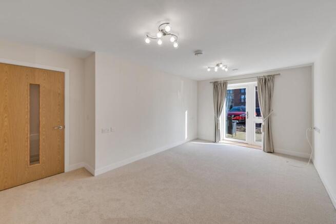 a room with a door and a window