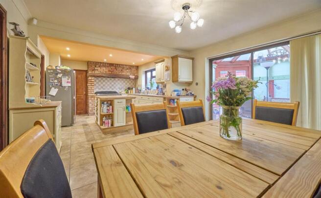 Open plan living/dining/kitchen to rear