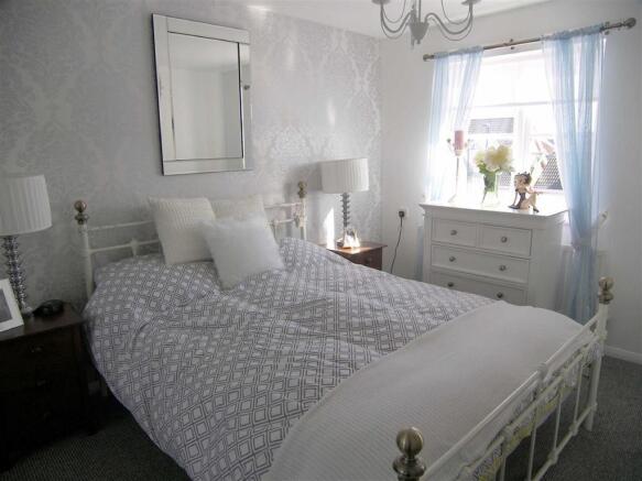 FRONT BEDROOM ONE