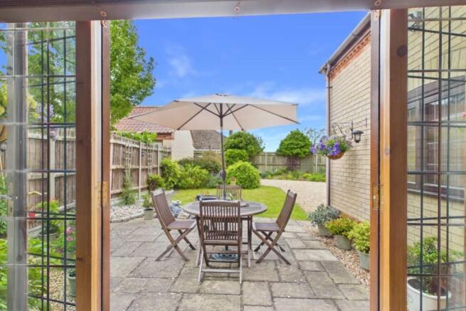 French doors leading from the living room outside
