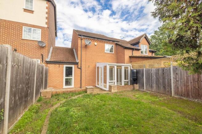 Rear Elevation / Garage Access