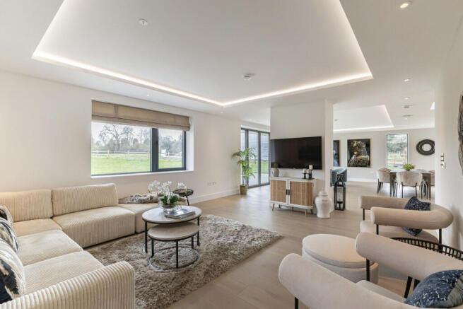 Internal photos are of the show home